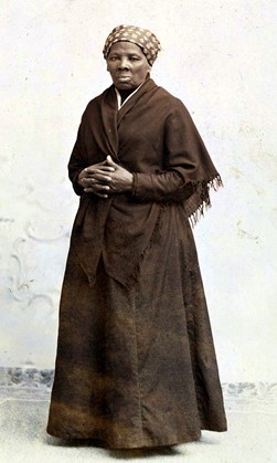 Picture of Harriet Tubman standing with hands folded
