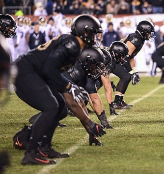 Defensive line ready for play to begin
