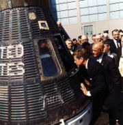 President Kennedy looks at Space craft