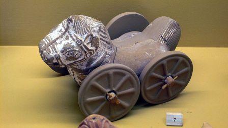 Picture of a Roman toy with wheels
