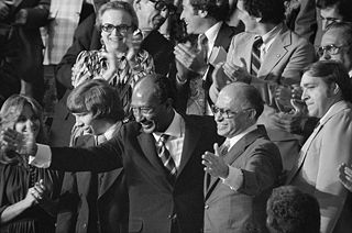 Anwar Sadat and Menachem Begin celebrating Accords