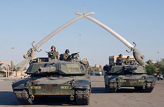 Tanks with Victory Arch in background